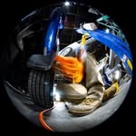Fisheye reflection in a car's chrome wheel